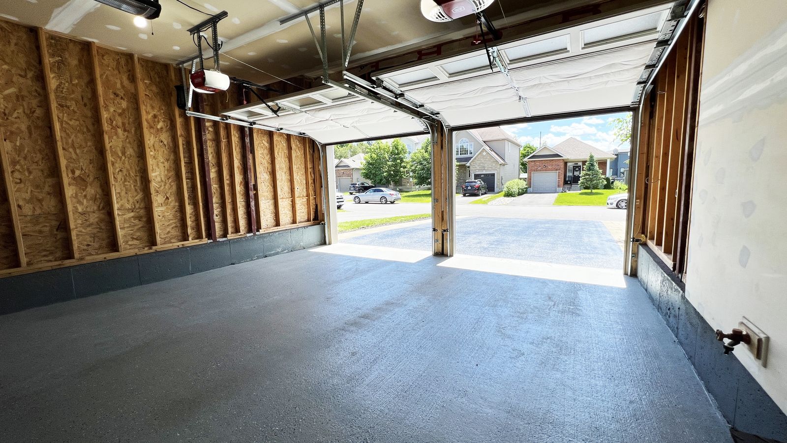 Double car garage with epoxy floors