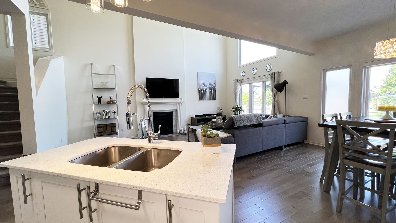 Kitchen island with living room and fireplace