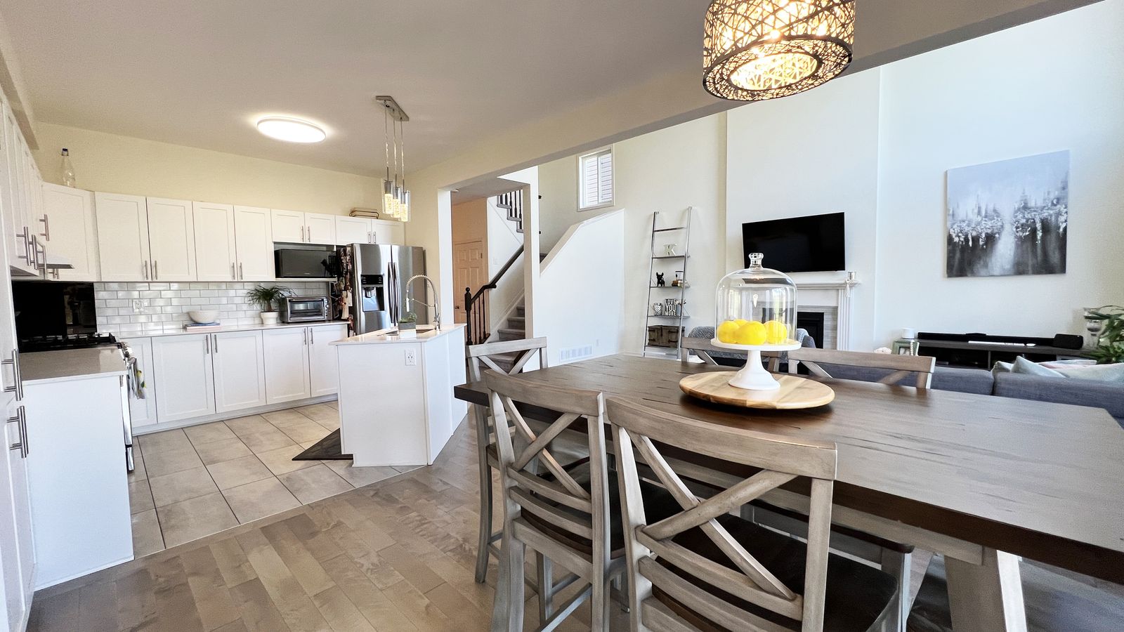 Kitchen with white cabinets and stainless appliances