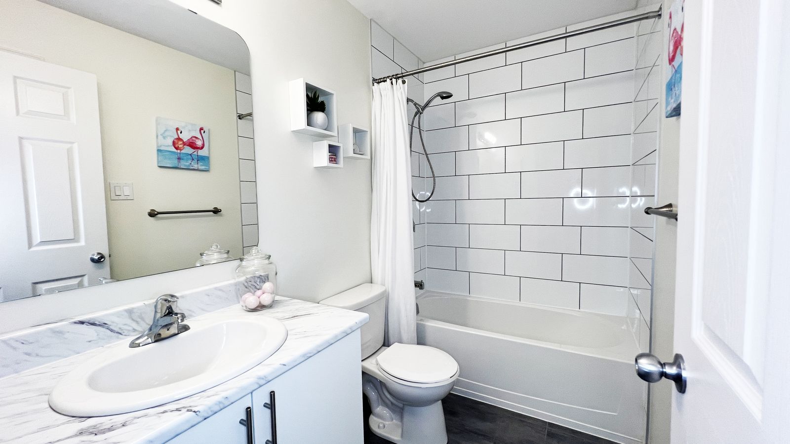 Main upstairs bathroom with tub and shower